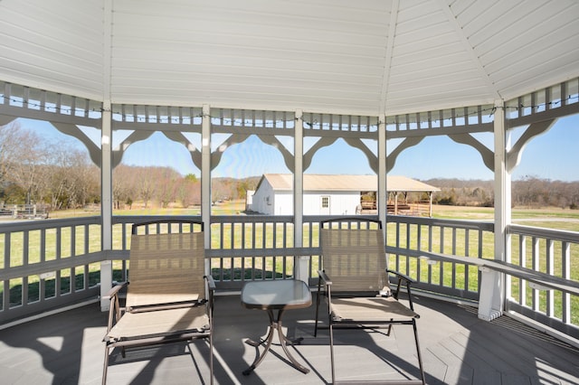 wooden deck featuring a gazebo