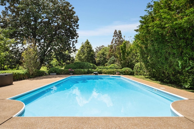 view of pool with central AC