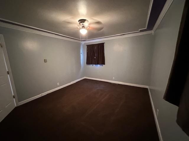 spare room with ceiling fan and ornamental molding