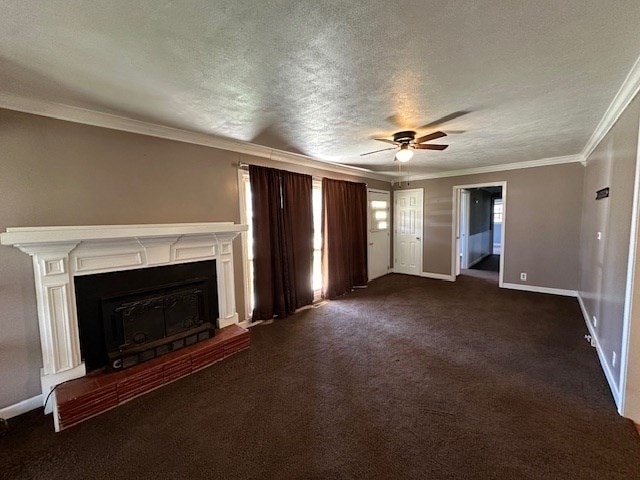 unfurnished living room with ceiling fan, dark colored carpet, ornamental molding, and a textured ceiling