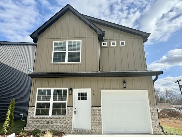 view of front of home with a garage