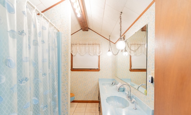 bathroom featuring tile patterned floors, toilet, lofted ceiling with beams, a shower with shower curtain, and vanity