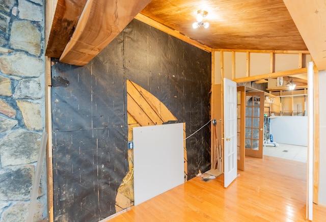 interior space with wood ceiling and wood-type flooring