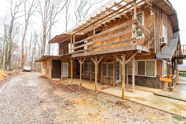 back of house with a patio area