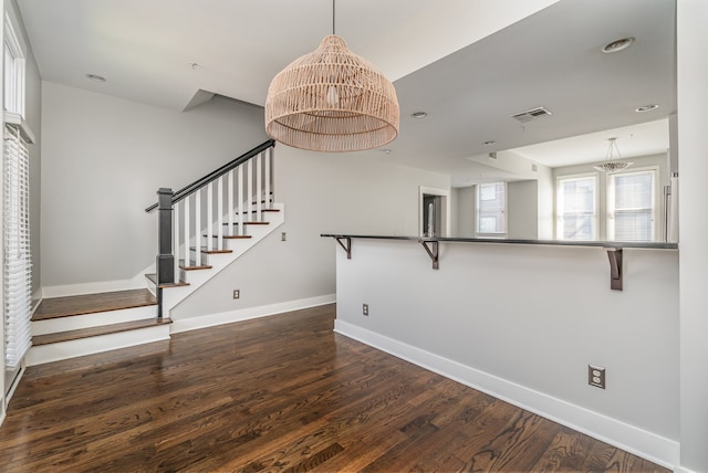 interior space featuring dark wood-type flooring