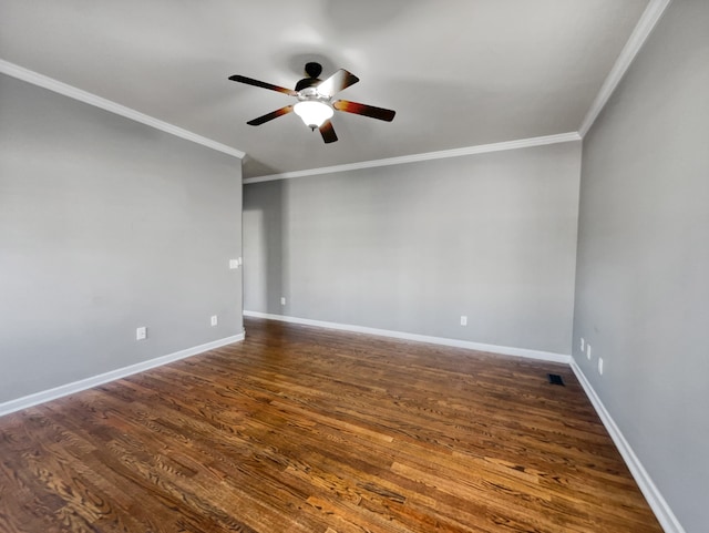 spare room with ornamental molding, dark hardwood / wood-style flooring, and ceiling fan