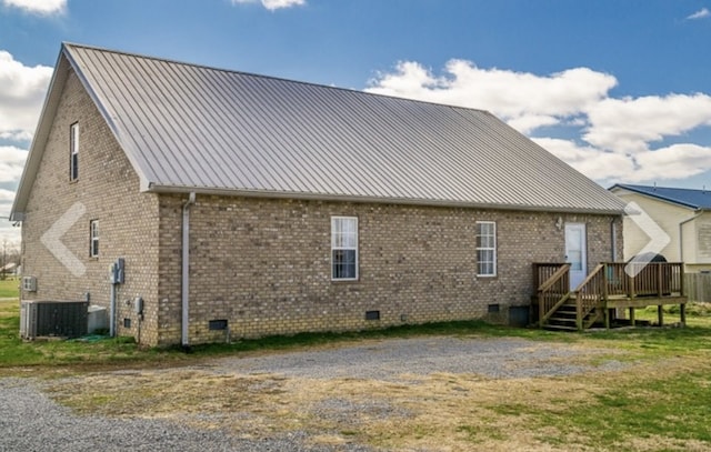 back of house with cooling unit