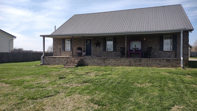 view of front of property with a porch and a front lawn