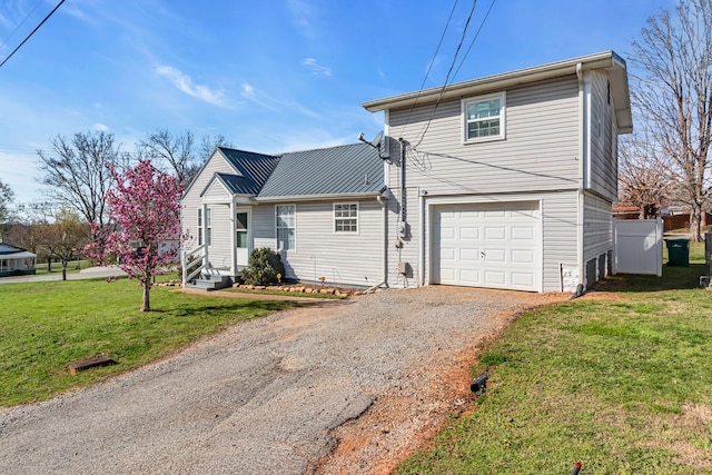 exterior space with a front yard and a garage