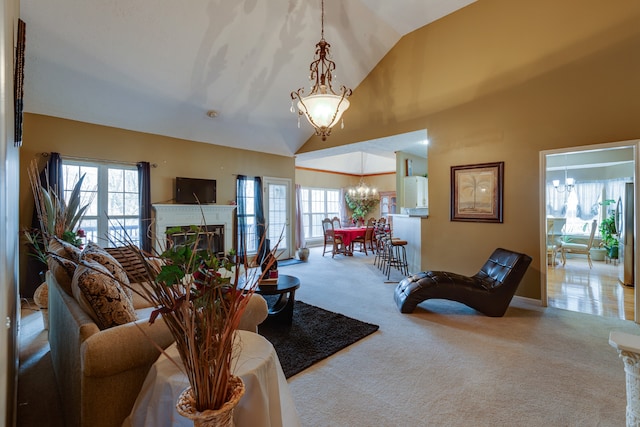 living room with a notable chandelier, high vaulted ceiling, and light tile floors