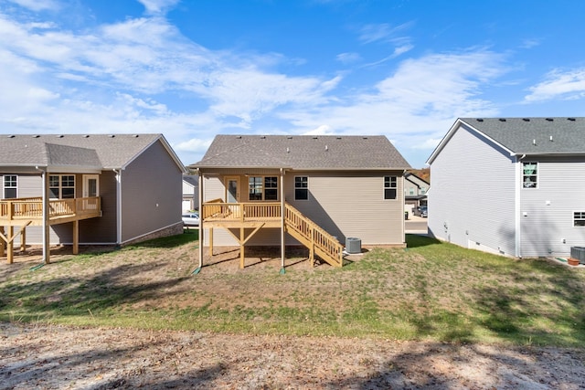 back of property featuring a deck