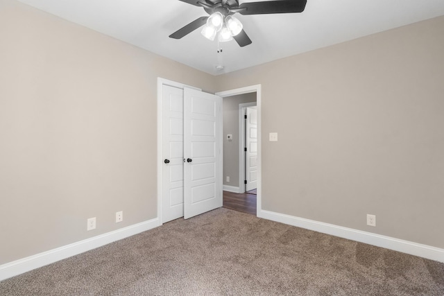 unfurnished bedroom with carpet flooring and ceiling fan