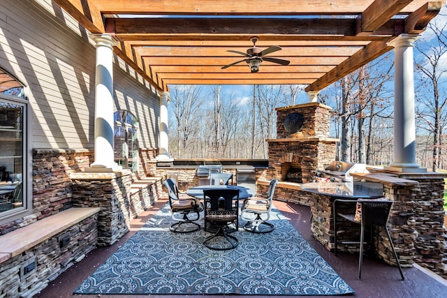 view of patio featuring a pergola, area for grilling, and ceiling fan