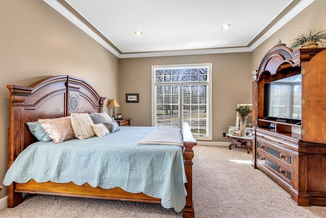 bedroom with light colored carpet, multiple windows, and ornamental molding