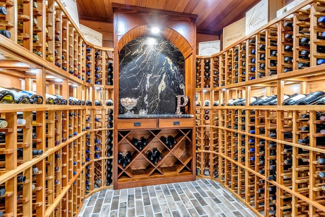 wine room featuring wooden ceiling