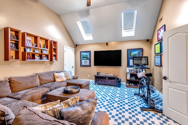 living room with lofted ceiling with skylight and ceiling fan