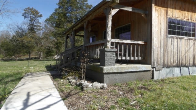 view of property exterior featuring a yard