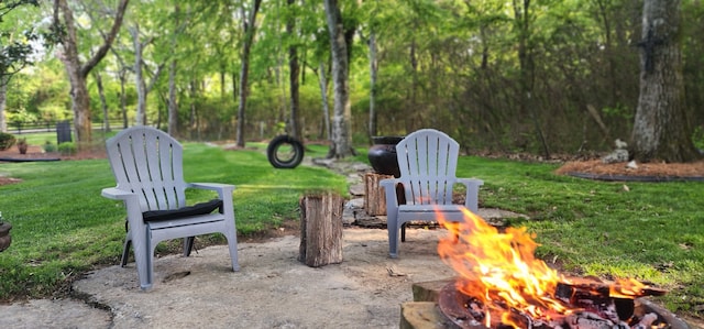 view of patio / terrace featuring a fire pit