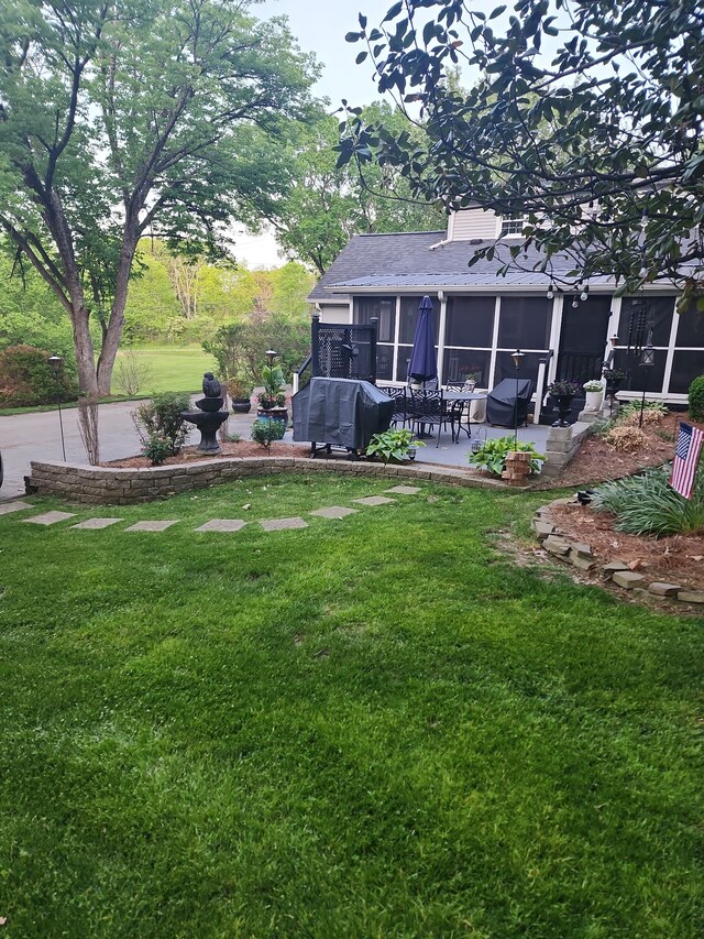 view of yard with a patio area