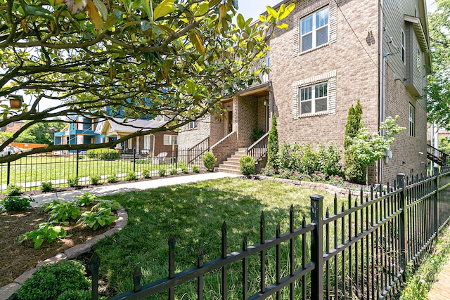 view of front of home with a front yard