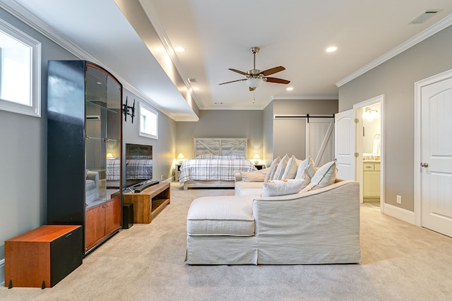 carpeted living room featuring a barn door, ceiling fan, and crown molding