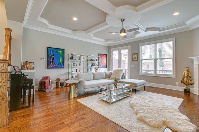 living room featuring coffered ceiling, dark hardwood / wood-style floors, ceiling fan, and ornamental molding