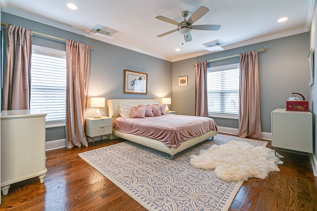 bedroom featuring ceiling fan, dark wood-type flooring, and crown molding