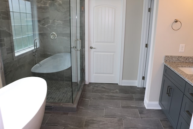 bathroom featuring vanity, separate shower and tub, and tile patterned flooring