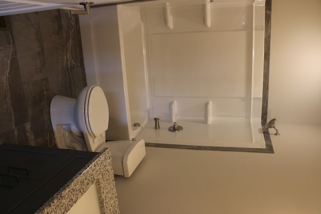 bathroom with vanity and toilet