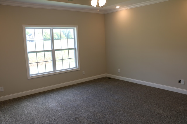 carpeted empty room with ornamental molding and ceiling fan