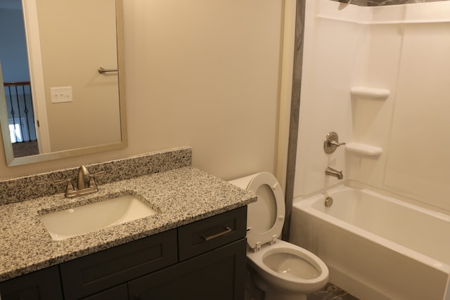 full bathroom with shower / tub combination, vanity, and toilet