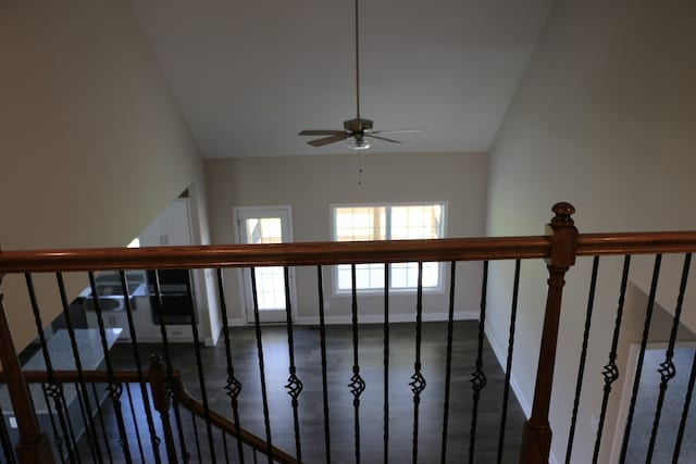 interior space featuring high vaulted ceiling and ceiling fan