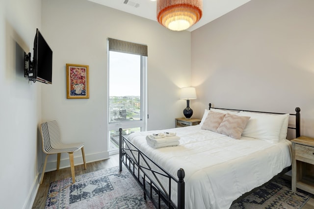 bedroom featuring hardwood / wood-style flooring