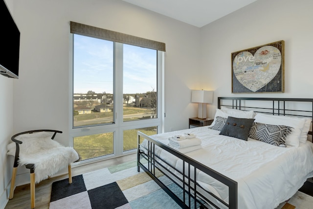 bedroom featuring light hardwood / wood-style floors