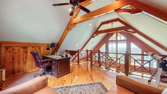 office with ceiling fan, lofted ceiling with beams, and light wood-type flooring