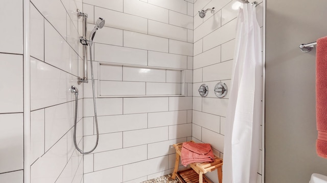 bathroom featuring a shower with curtain