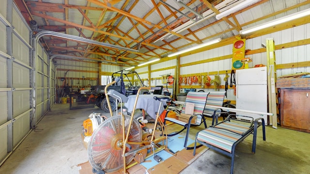 garage with white fridge