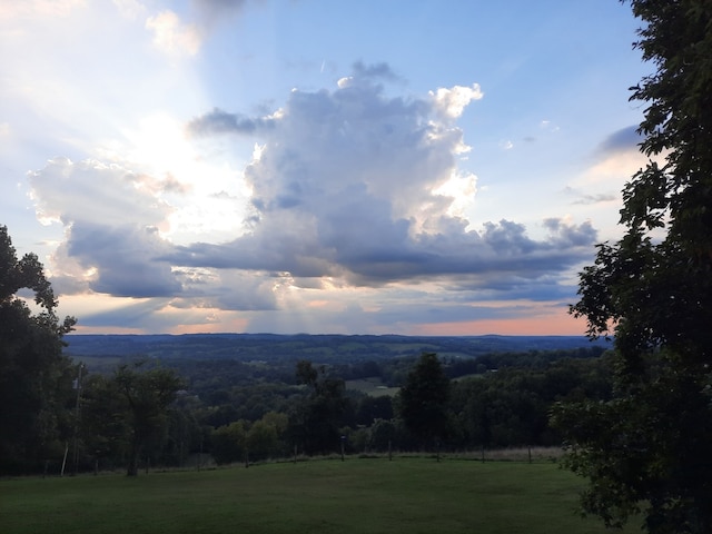 property view of mountains featuring a rural view