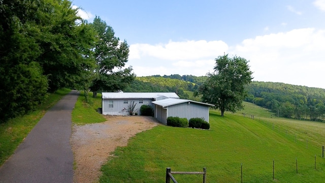 exterior space with a rural view