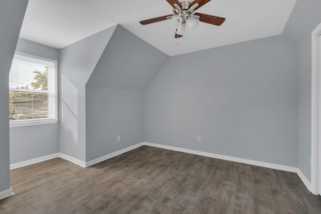 additional living space featuring lofted ceiling, ceiling fan, and dark hardwood / wood-style floors