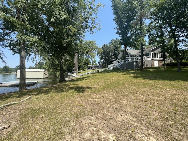 view of yard with a water view