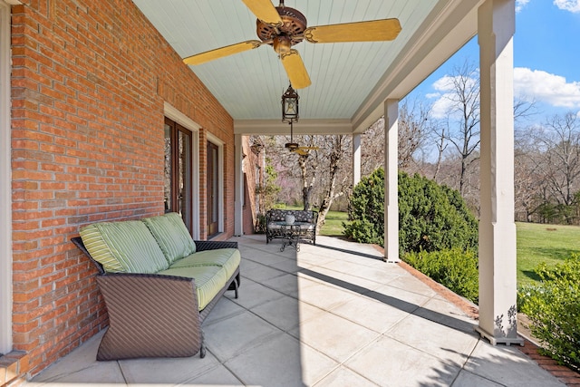 view of patio / terrace featuring covered porch and ceiling fan