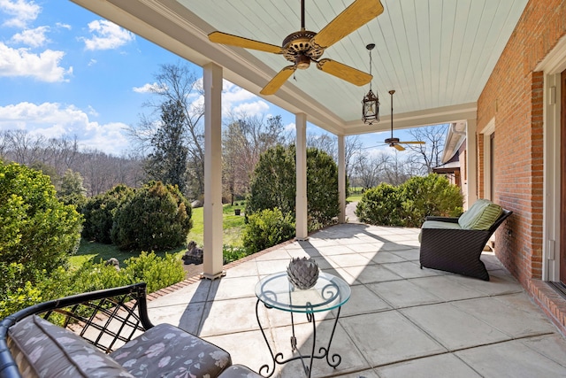 view of terrace with ceiling fan