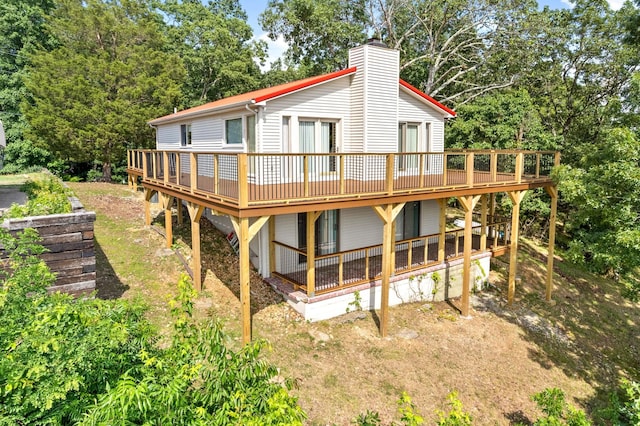 rear view of property with a deck