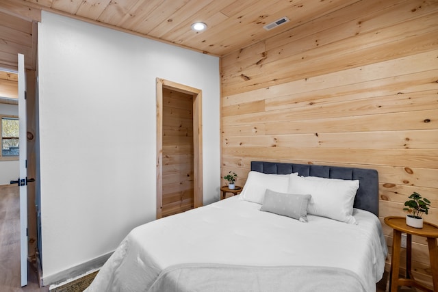 bedroom with wood ceiling