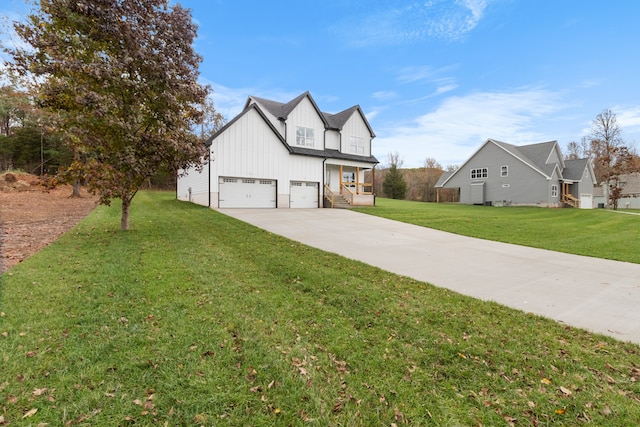 view of front facade featuring a garage and a front lawn