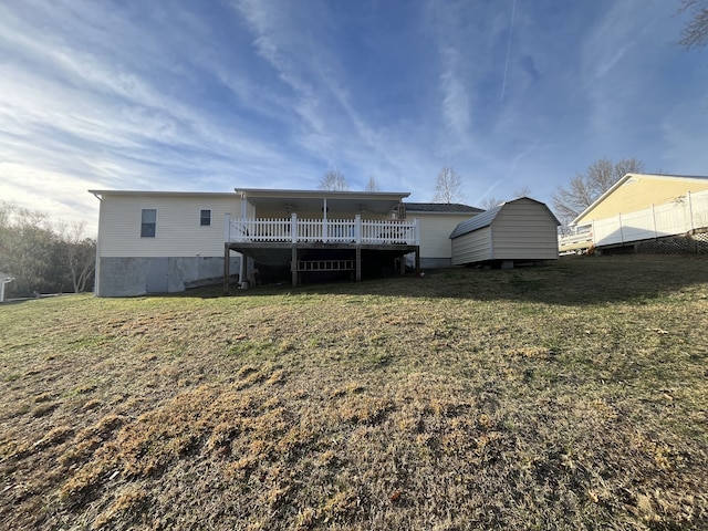 back of property featuring a yard