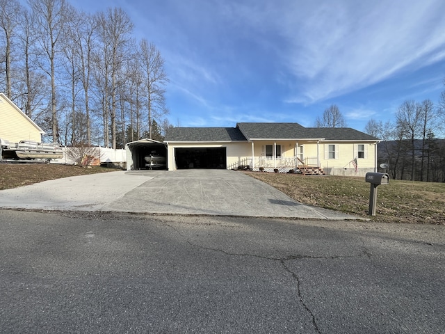 view of front facade featuring covered porch and a garage