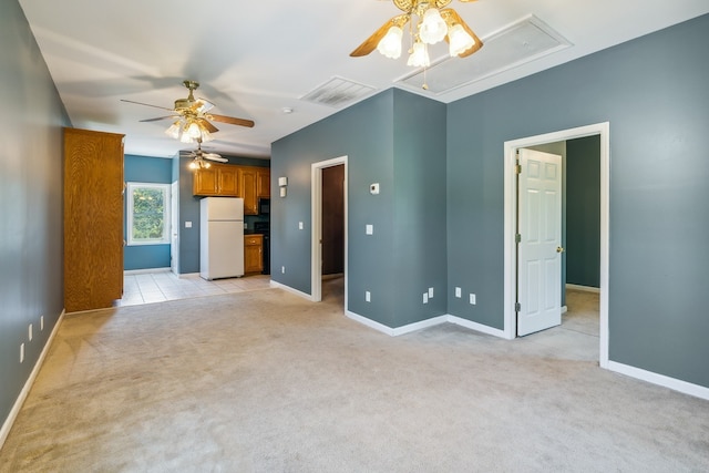 carpeted empty room with ceiling fan