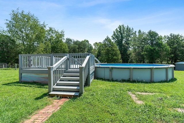 exterior space with a deck and a yard